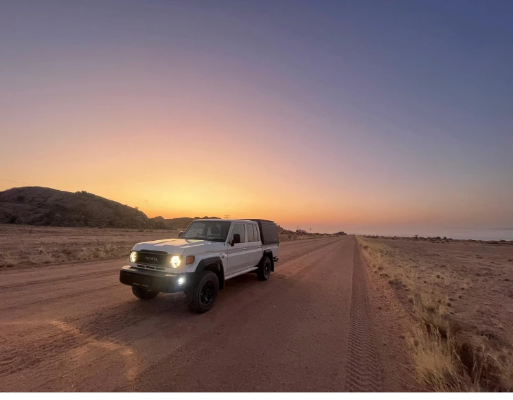 Toyota Land Cruiser 4x4 rental on South African gravel terrain from Adv Bike Co.